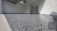 Thumbnail for Full flake garage floor and matching coves installed over a self leveling 100% solids fast cure epoxy base.