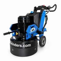 Thumbnail for Grizzly Grinders Momma Bear planetary concrete floor grinder with a blue frame, black motor cover, and Grinders.com branding on the base against a white background.