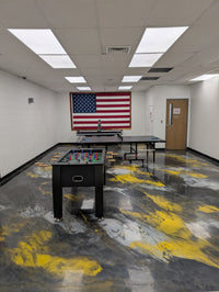 Thumbnail for Designer game room floor featuring a gold, silver, and black metallic design in a high-gloss, self-leveling 100% solids epoxy finish