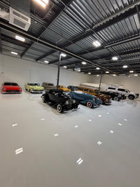 Thumbnail for High-gloss solid white polyaspartic showroom floor using Poly Gloss 85 Slow Go for a seamless, non-yellowing finish